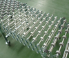 Convoyeur de roues à roulettes en acier extensible flexible pour manutention des matériaux