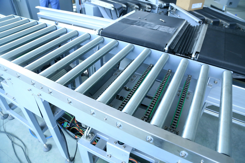 Convoyeur de transfert de levage