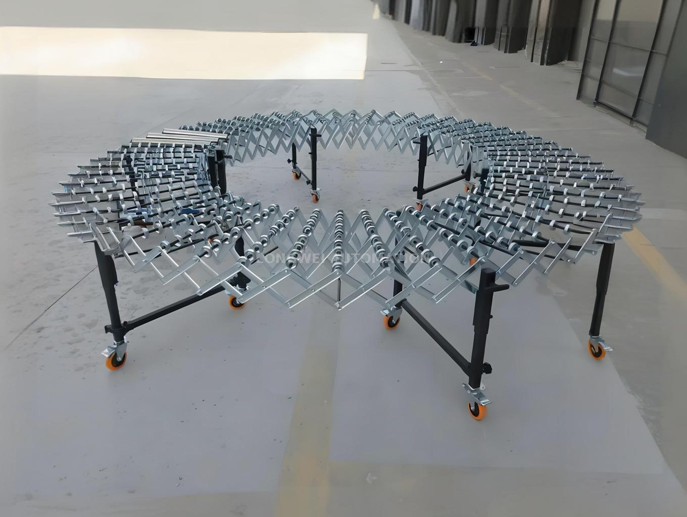 Convoyeur de roues à roulettes en acier extensible flexible pour manutention des matériaux
